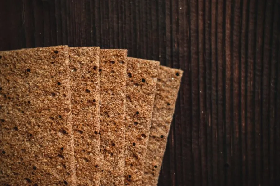 Fiber fortified crackers on a table mat.